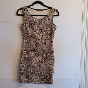 SYMPHONY Animal Print Sleeveless Scoop Neck Dress. Short with 2 Slits At Bottom.